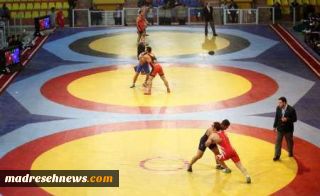 قهرمانی دانش آموز البرزی در مسابقات کشتی جام روز جهانی کودک